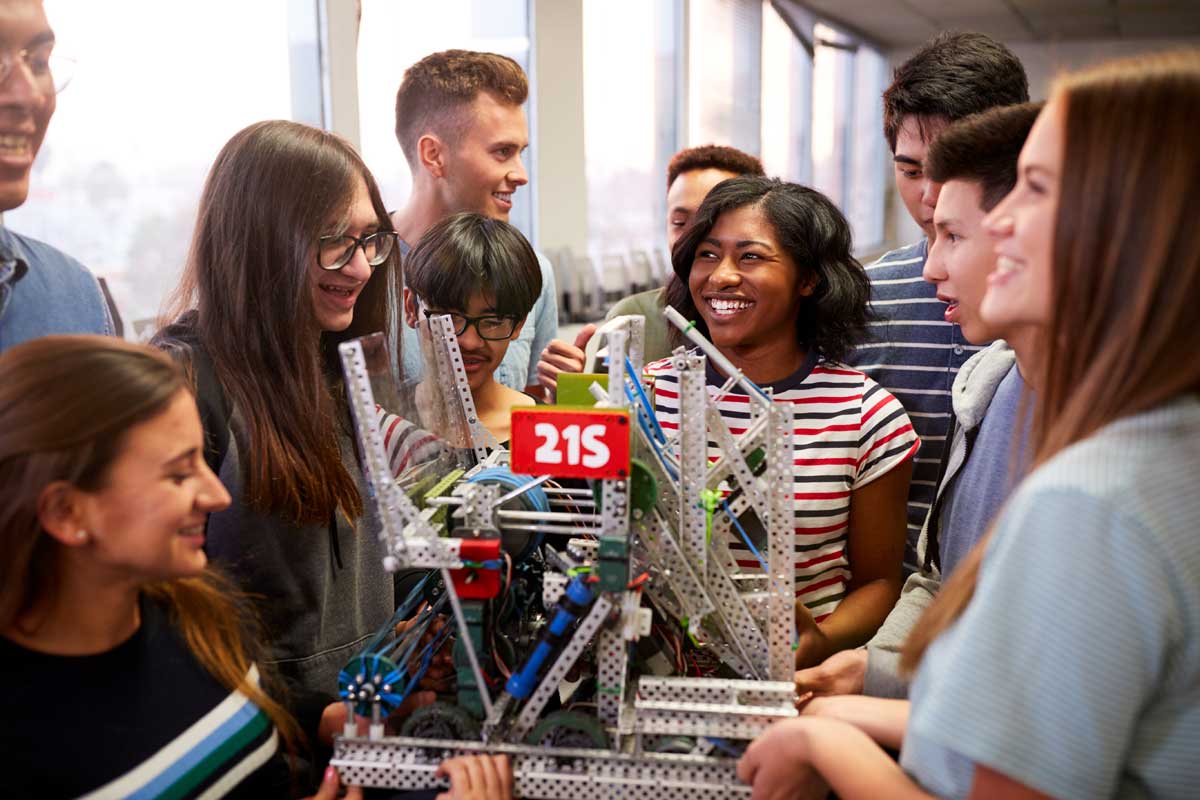 Students participating in robotics competition